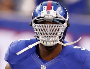 Justin Tuck wearing the Big Grill 2.0